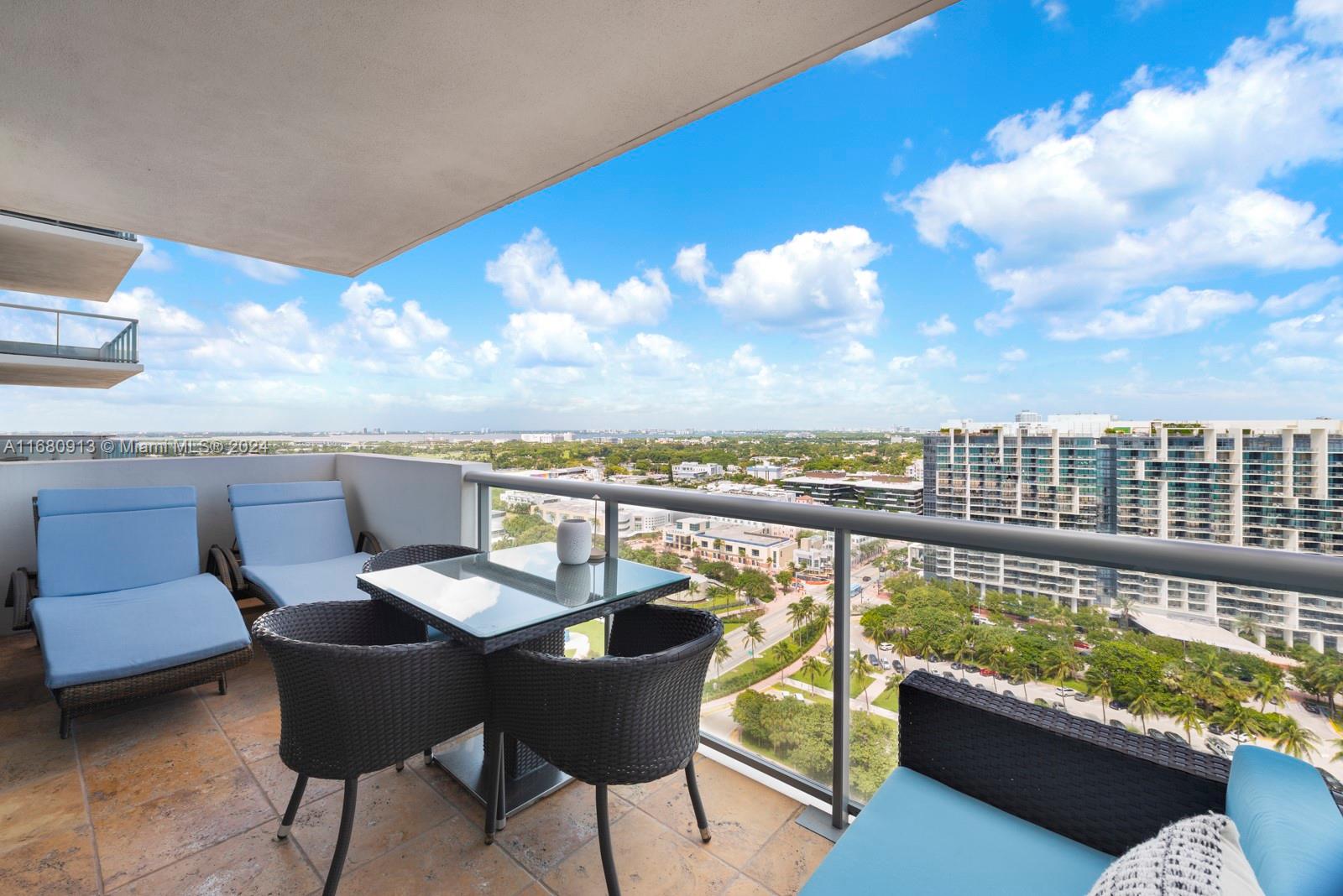 101 20th Street, Unit 2603 Miami Beach, FL 33139 - Photo 13 of 16 a view of a chairs and table in patio