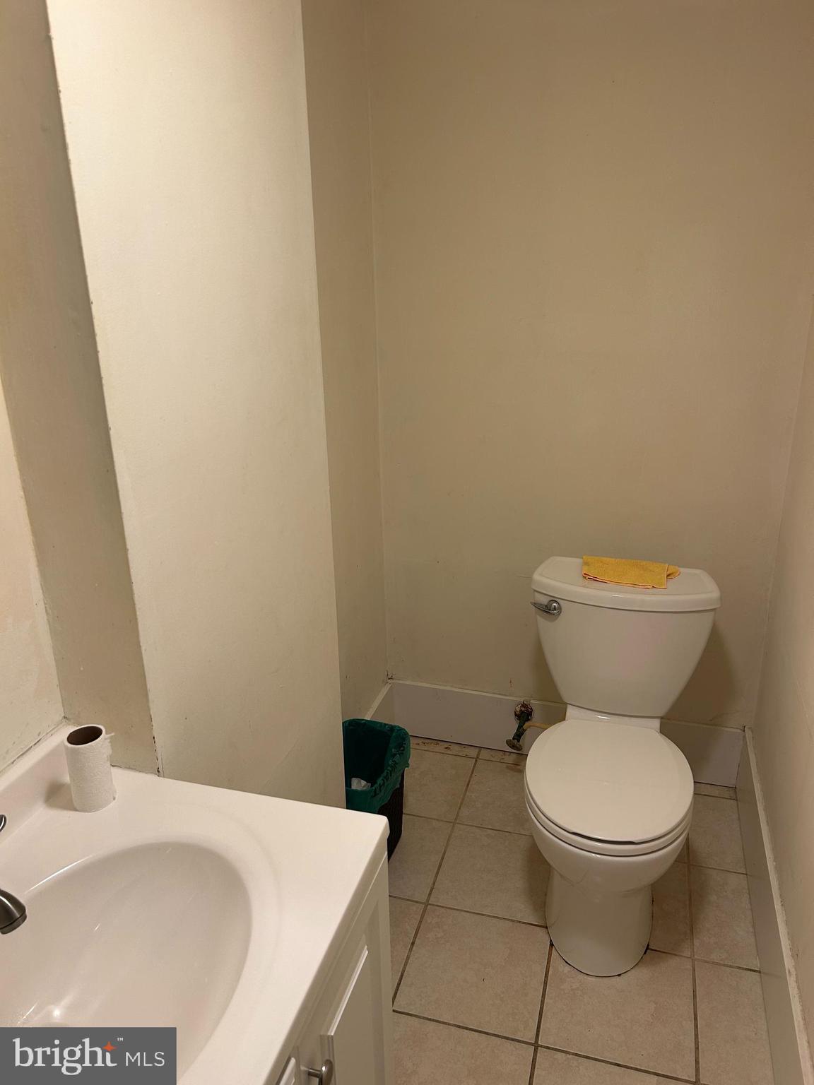 35 Willow Court Elkton, MD 21921 - Photo 8 of 10 a white toilet sitting next to a bathroom sink