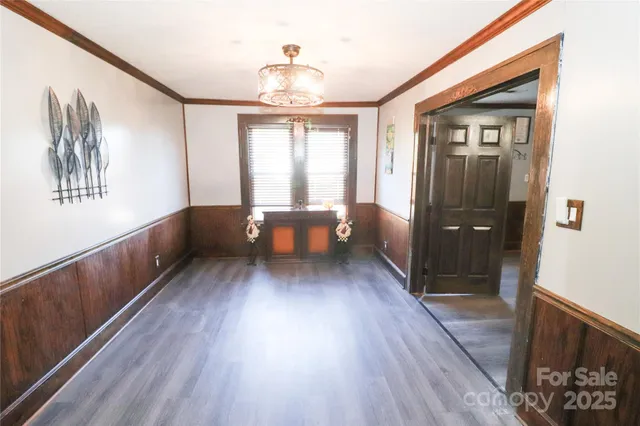 a view of entryway with wooden floor