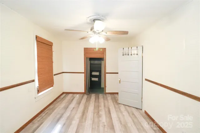 a view of a livingroom with wooden floor