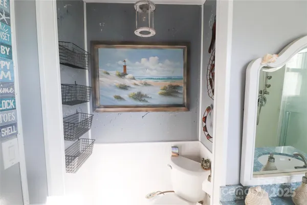 a bathroom with a tub and shower
