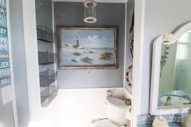 a bathroom with a tub and shower