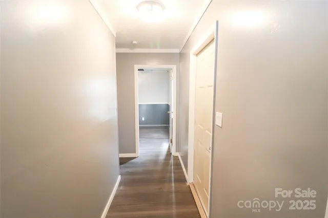 a view of a bathroom from a hallway