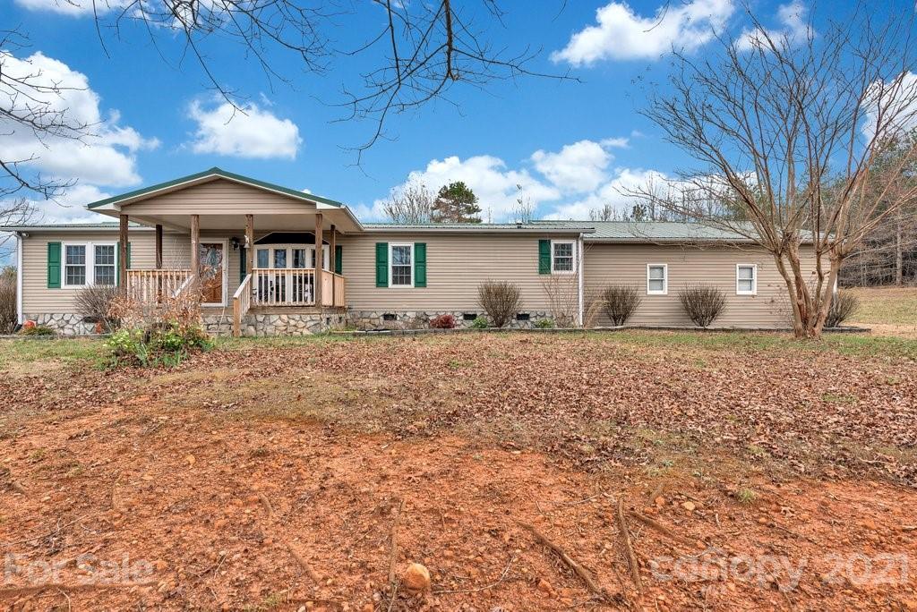 3683 Big Island Road Rutherfordton, NC 28139 - Photo 11 of 41 a front view of a house with garden