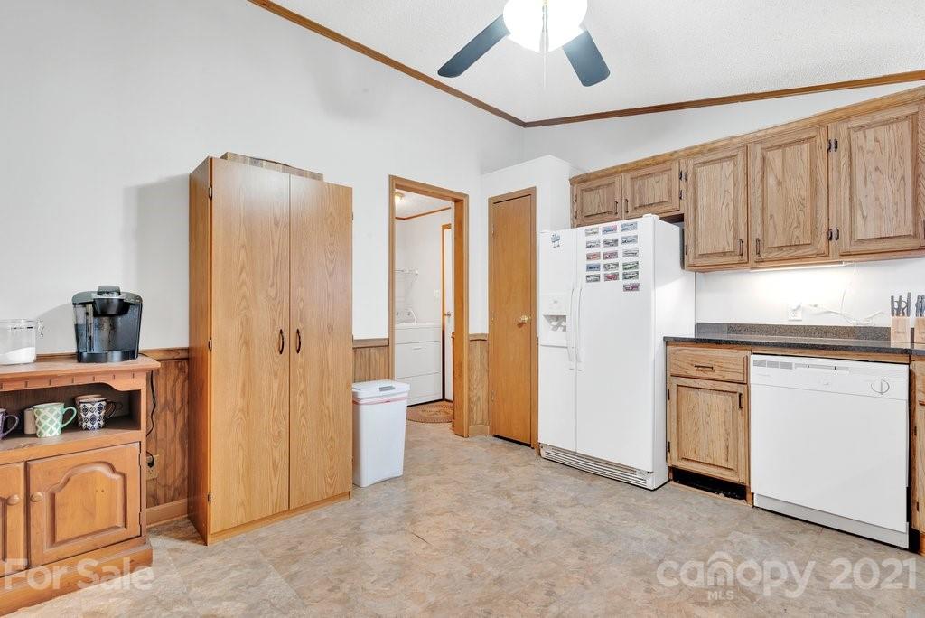 3683 Big Island Road Rutherfordton, NC 28139 - Photo 23 of 41 a kitchen with stainless steel appliances a refrigerator and cabinets