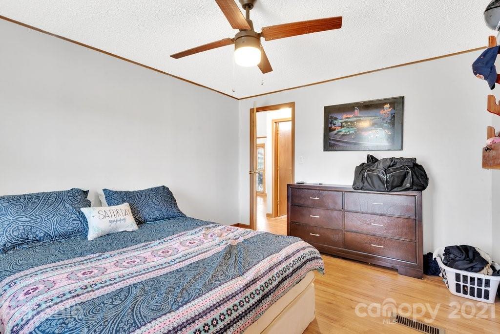 3683 Big Island Road Rutherfordton, NC 28139 - Photo 40 of 41 a bedroom with a bed and a dresser in it