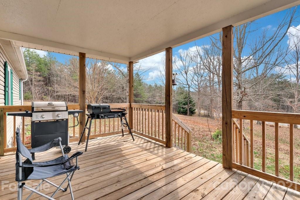 3683 Big Island Road Rutherfordton, NC 28139 - Photo 41 of 41 a living room with large windows and wooden floor