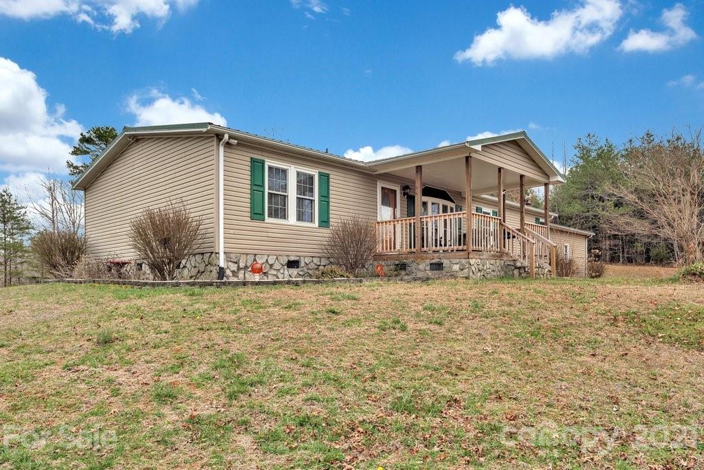 3683 Big Island Road Rutherfordton, NC 28139 - Photo 9 of 41 a front view of a house with garden