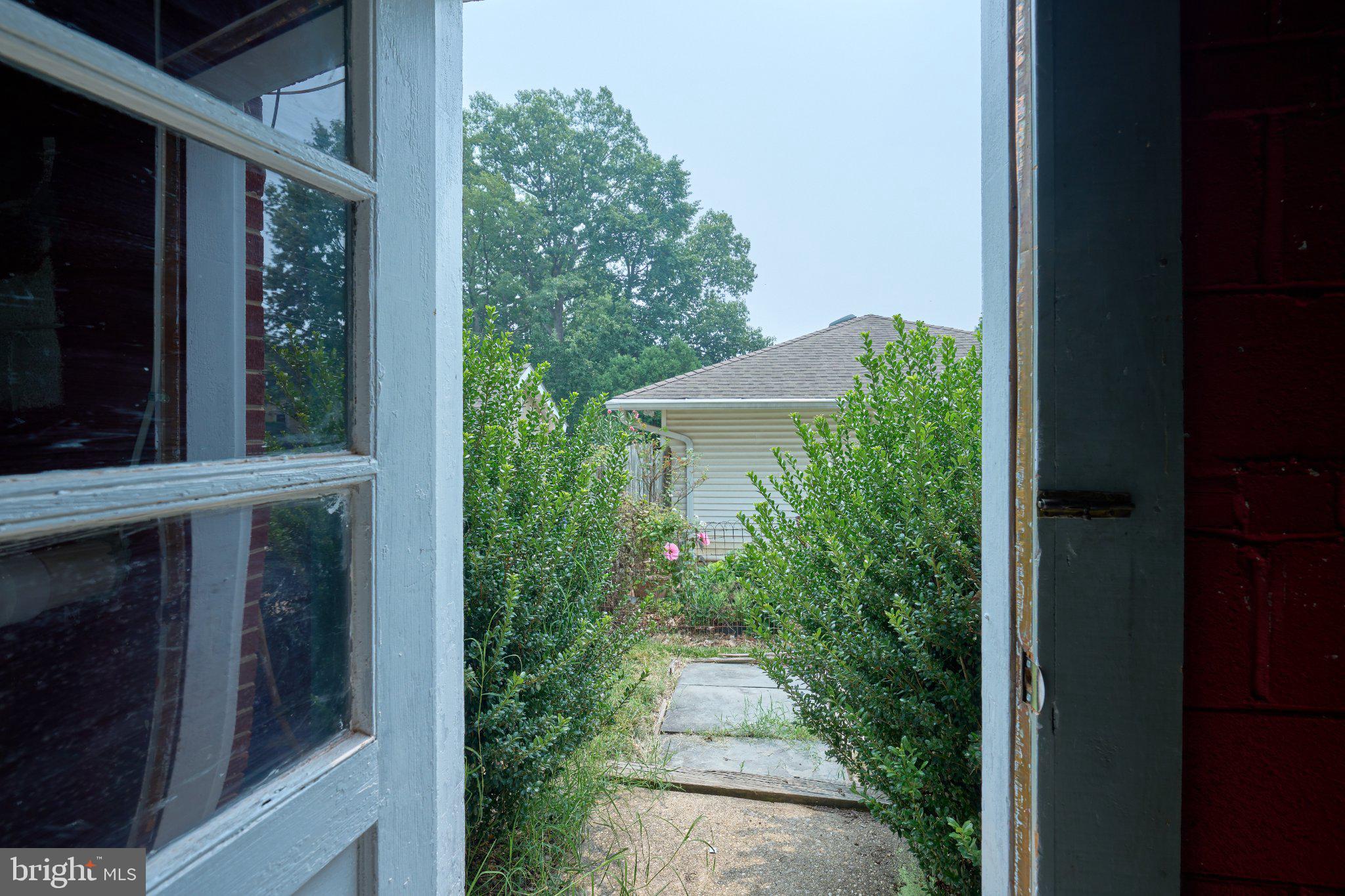 2924 Gracefield Road Silver Spring, MD 20904 - Photo 42 of 57 Inviting path to a serene garden.