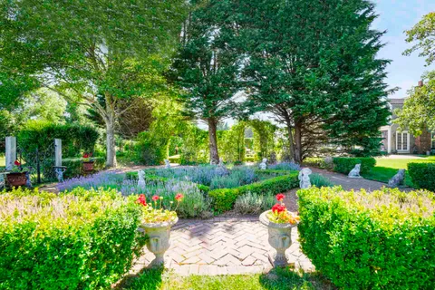 a view of a street with a park