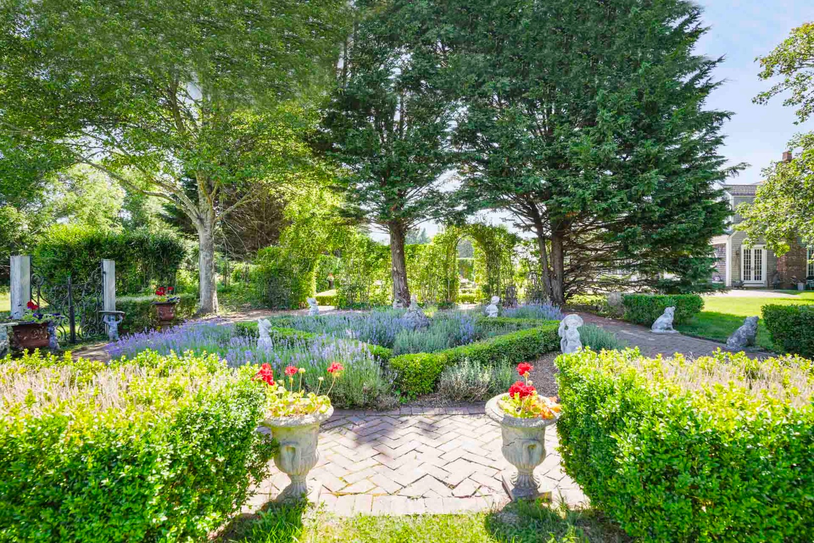5 Louis Field Road Edgartown, MA 02539 - Photo 14 of 33 a view of a yard with plants and large trees