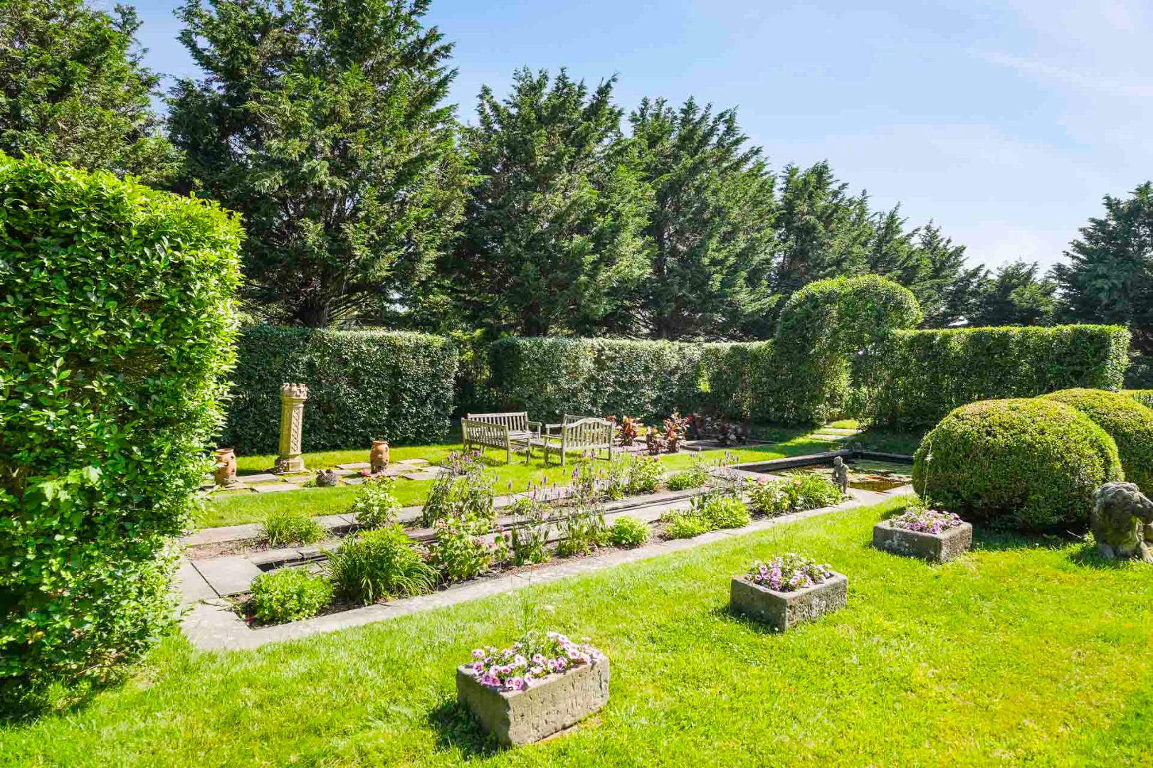 5 Louis Field Road Edgartown, MA 02539 - Photo 16 of 33 a view of a backyard with plants and patio