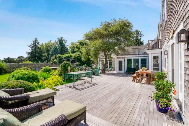 a view of swimming pool with seating space and garden