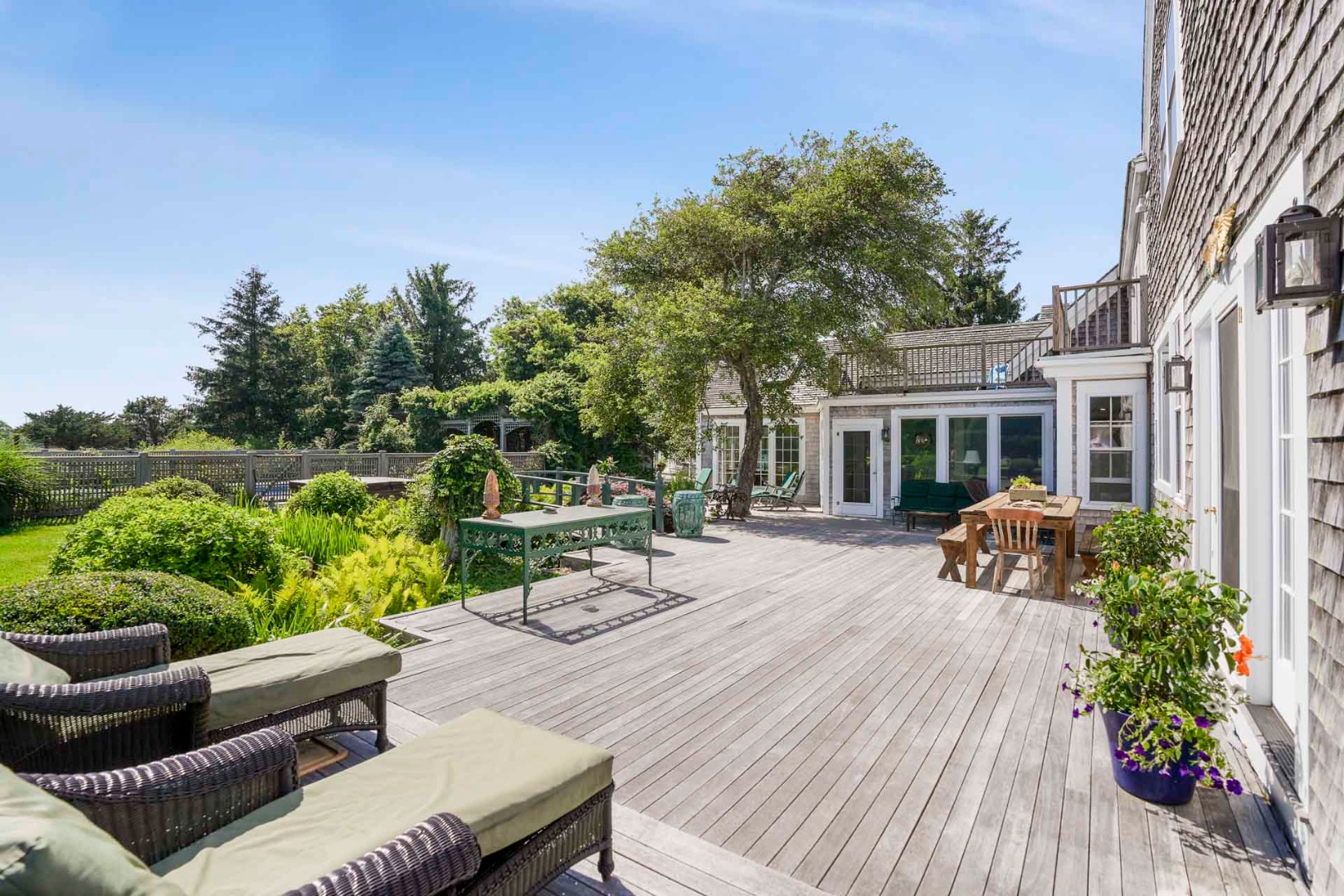 5 Louis Field Road Edgartown, MA 02539 - Photo 21 of 33 a view of a house with backyard sitting area and garden