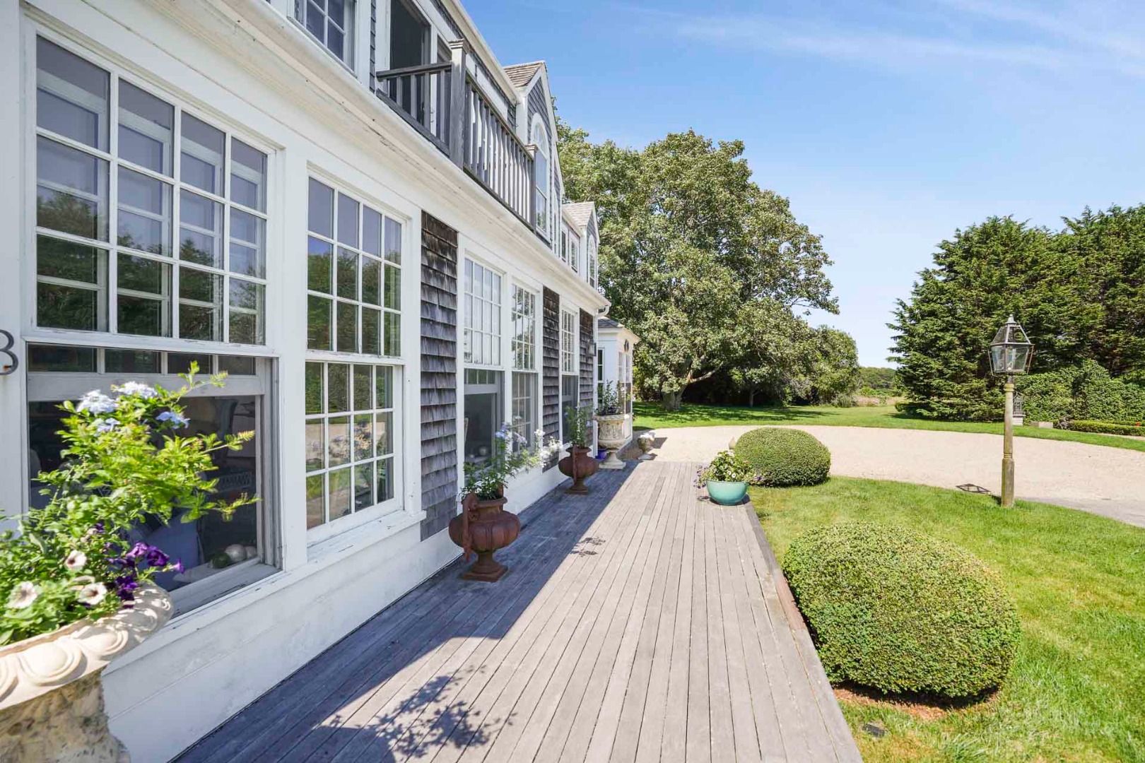 5 Louis Field Road Edgartown, MA 02539 - Photo 22 of 33 a view of swimming pool with seating space and garden