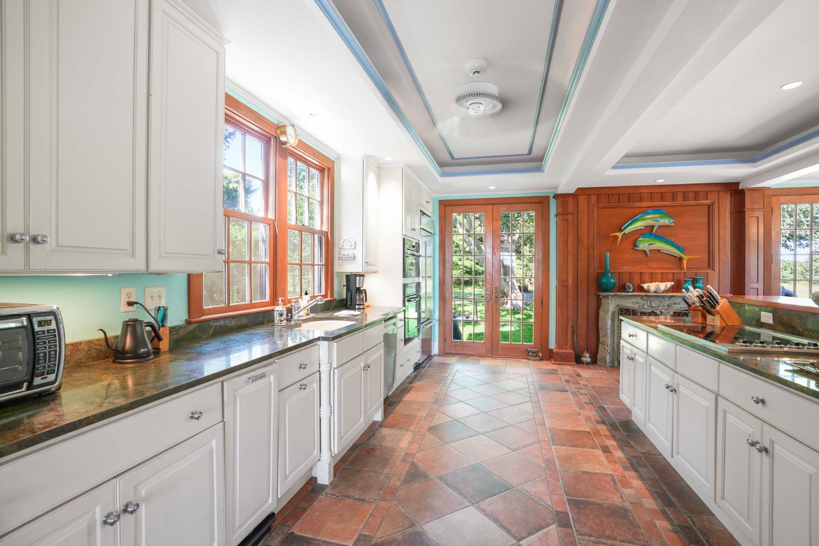 5 Louis Field Road Edgartown, MA 02539 - Photo 27 of 33 a large white kitchen with a large window