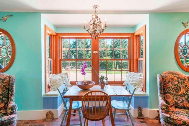 a bed room with furniture and a window