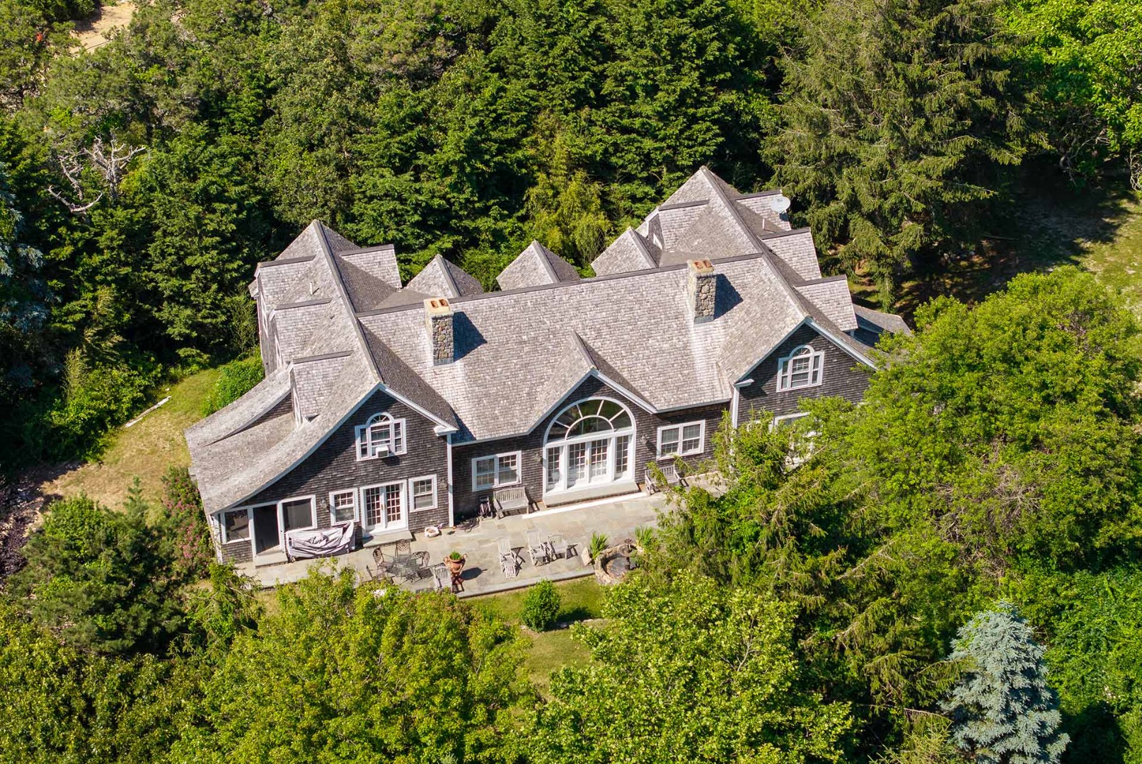 5 Louis Field Road Edgartown, MA 02539 - Photo 6 of 33 an aerial view of a house with yard and trees in the background