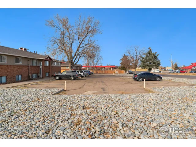 a view of swimming pool with a yard