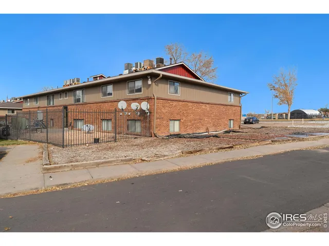 a view of a house with a street