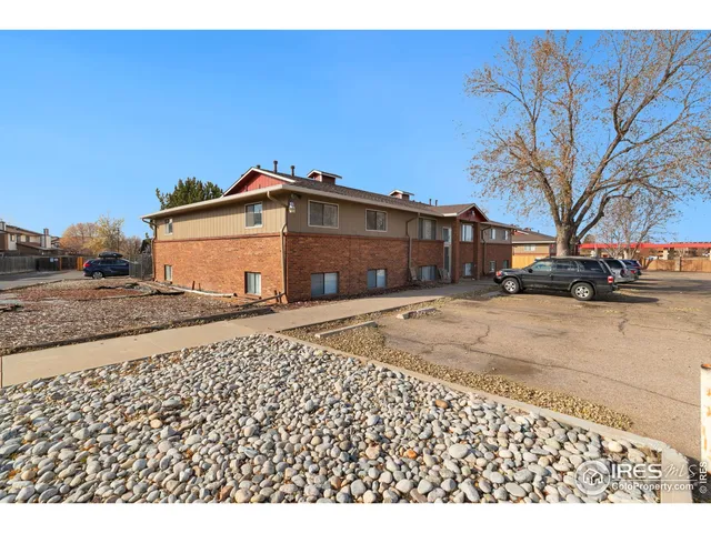 a black white house with a outdoor space