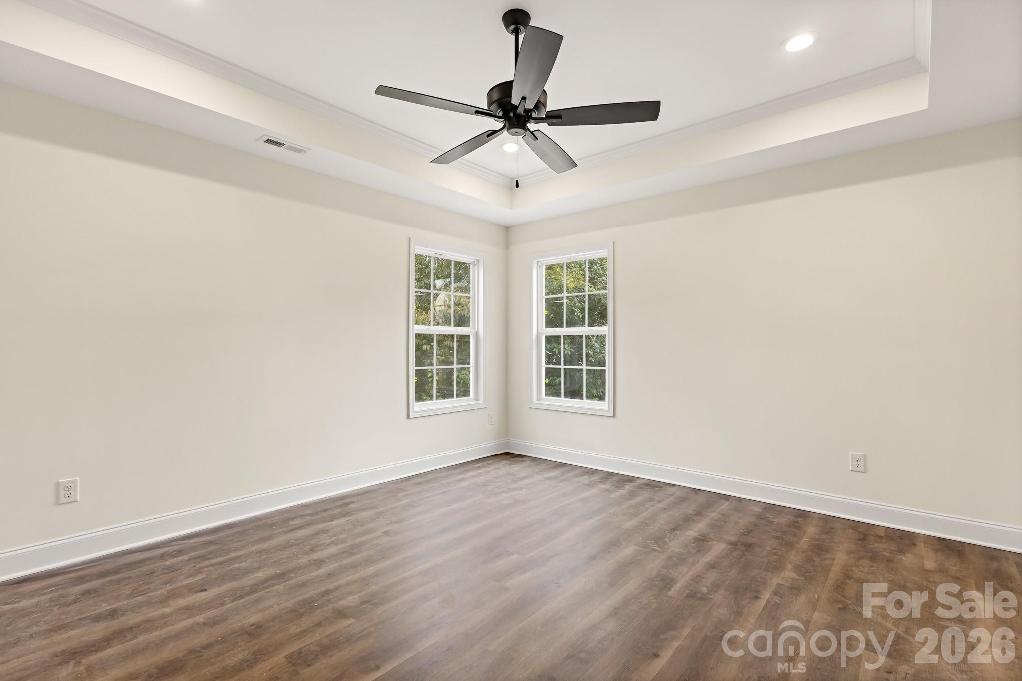545 Washington Street Rock Hill, SC 29730 - Photo 21 of 29 a view of an empty room with wooden floor and a window