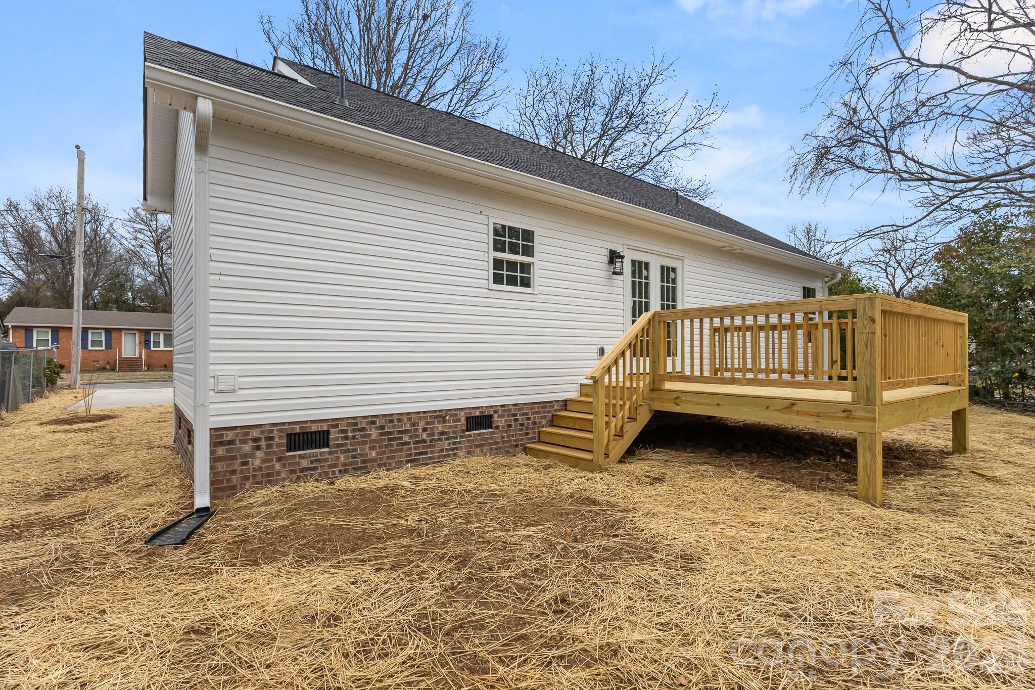 545 Washington Street Rock Hill, SC 29730 - Photo 29 of 29 a view of a house with a yard and wooden fence