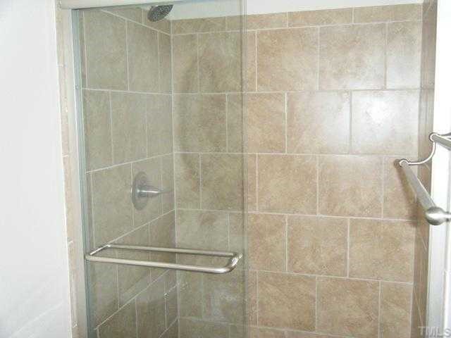 5606 Earl Road Durham, NC 27712 - Photo 4 of 10 a bathroom with a shower