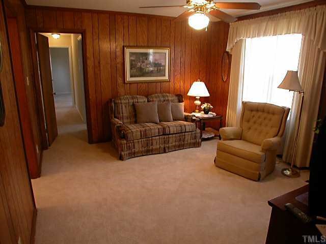 5606 Earl Road Durham, NC 27712 - Photo 8 of 10 a living room with furniture and a window