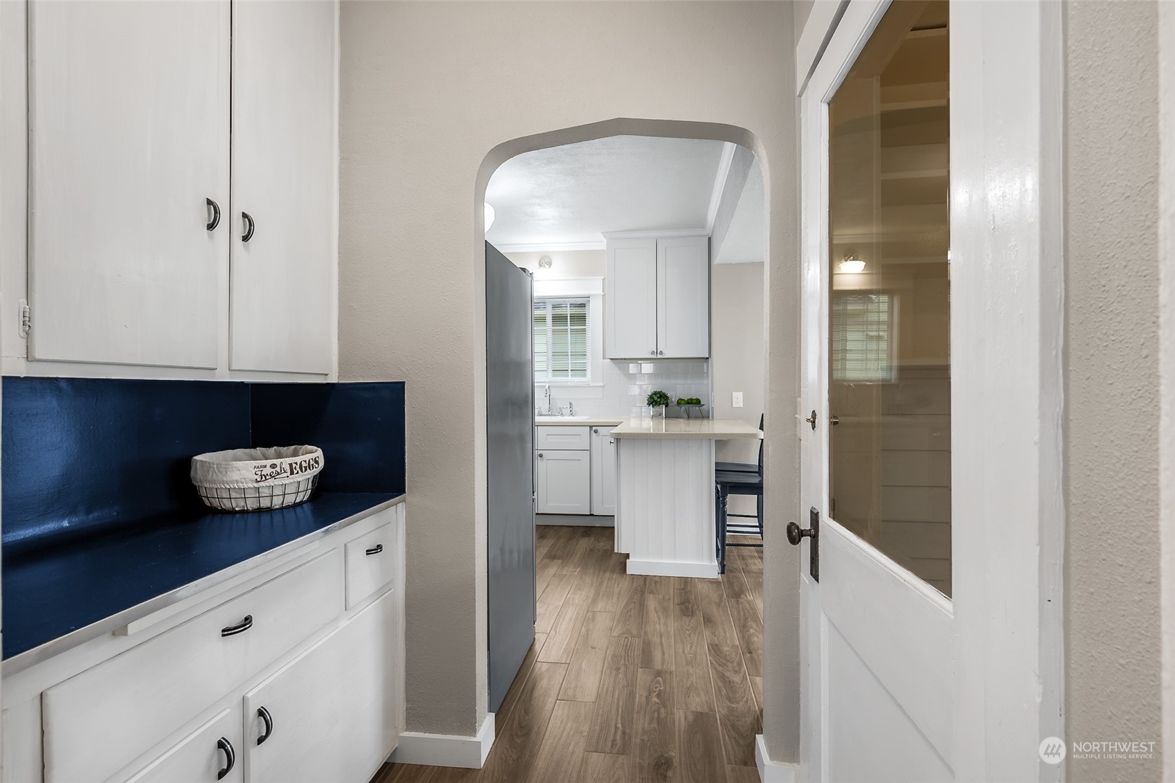 190 Southwest Lewis Street Chehalis, WA 98532 - Photo 14 of 30 a kitchen with white cabinets and window
