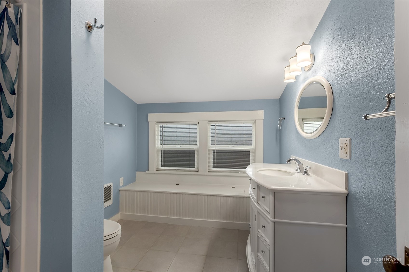 190 Southwest Lewis Street Chehalis, WA 98532 - Photo 23 of 30 a bathroom with a sink and a mirror