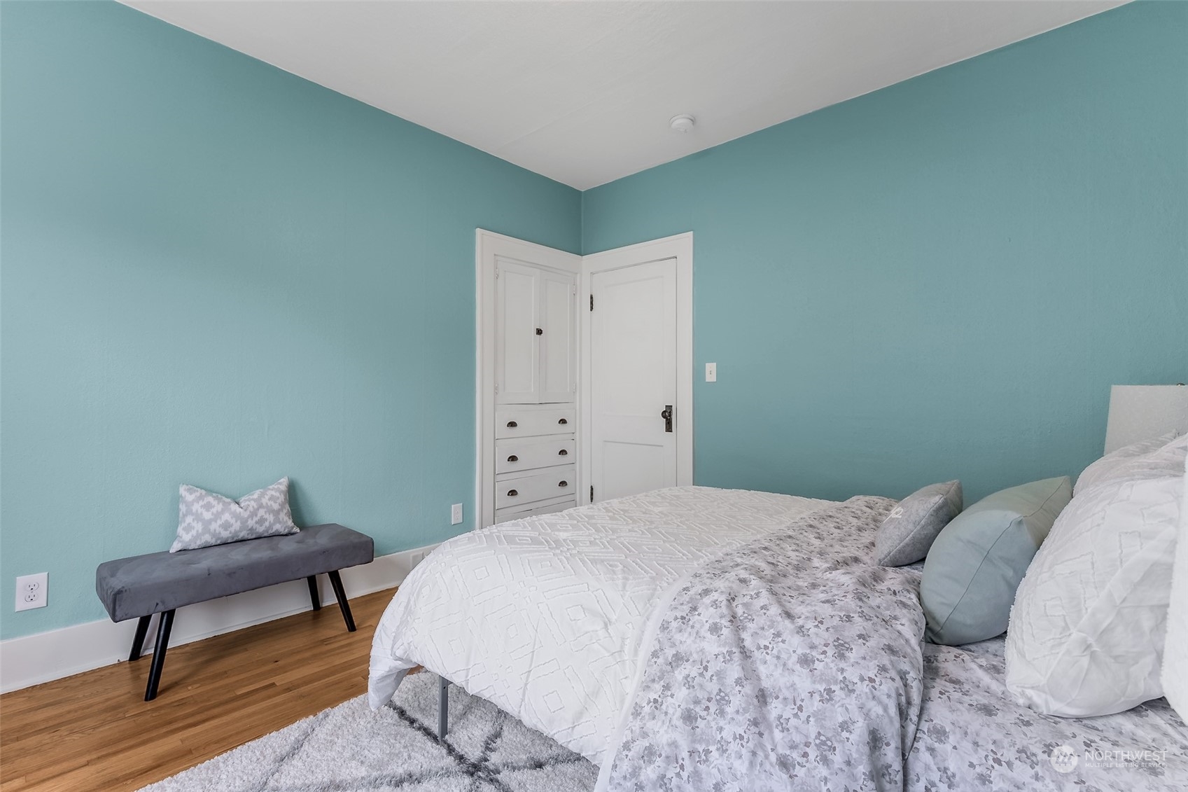 190 Southwest Lewis Street Chehalis, WA 98532 - Photo 8 of 30 a bedroom with a bed and a chair