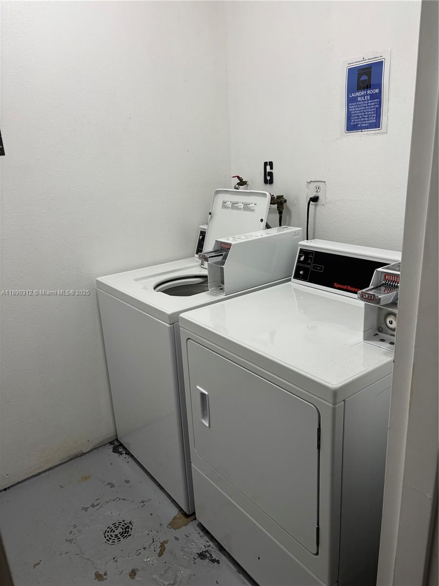 6901 Environ Boulevard, Unit 3F Lauderhill, FL 33319 - Photo 12 of 16 a utility room with dryer and washer