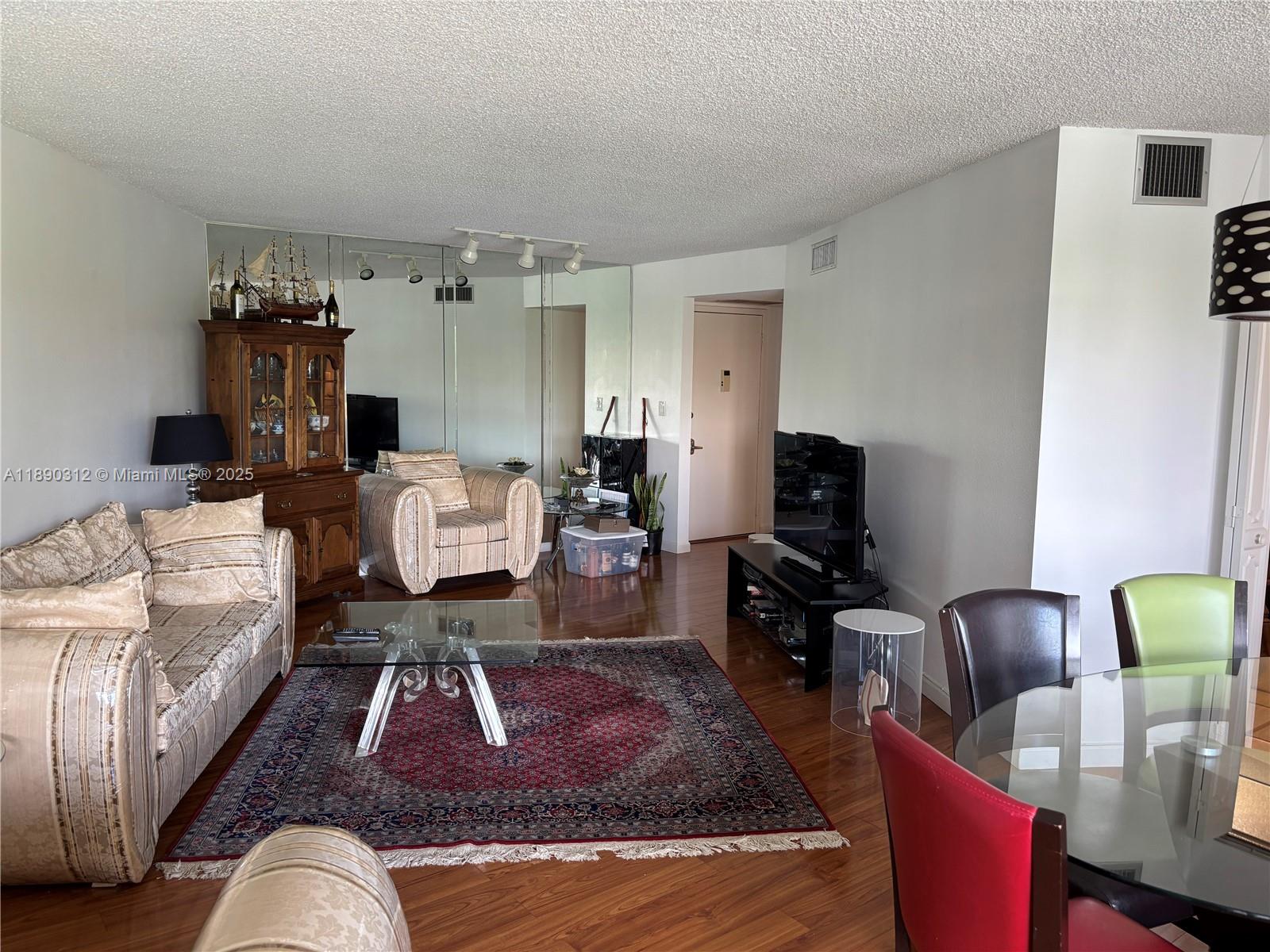 6901 Environ Boulevard, Unit 3F Lauderhill, FL 33319 - Photo 2 of 16 a living room with furniture