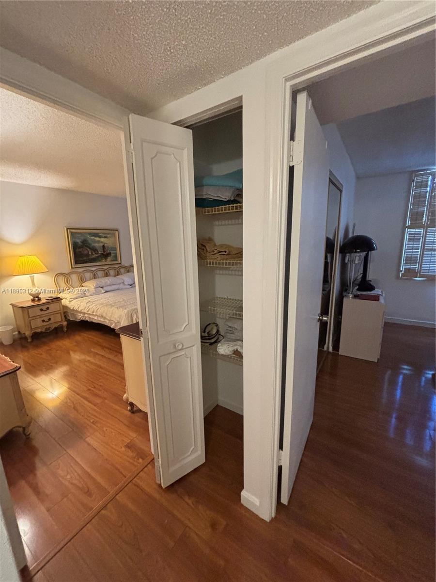 6901 Environ Boulevard, Unit 3F Lauderhill, FL 33319 - Photo 6 of 16 a view of a living room and hardwood floor