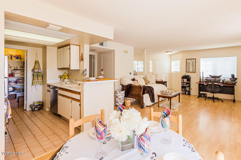 1225 Fitzgerald Road, Unit B Simi Valley, CA 93065 - Photo 12 of 34 a very nice looking living room with dining room and wooden floor