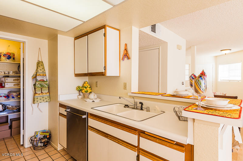 1225 Fitzgerald Road, Unit B Simi Valley, CA 93065 - Photo 14 of 34 a bathroom with a sink and a mirror
