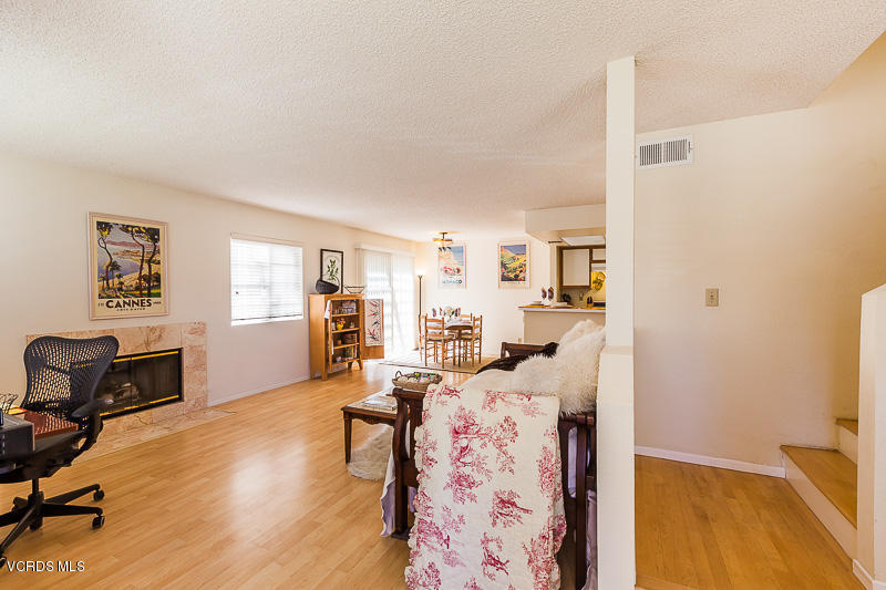 1225 Fitzgerald Road, Unit B Simi Valley, CA 93065 - Photo 3 of 34 a living room with furniture and a wooden floor