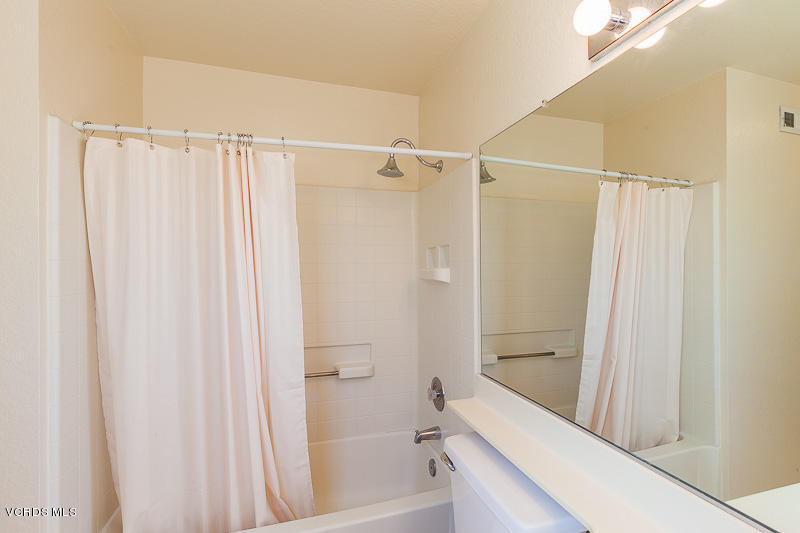 1225 Fitzgerald Road, Unit B Simi Valley, CA 93065 - Photo 21 of 34 a bathroom with a shower and a tub