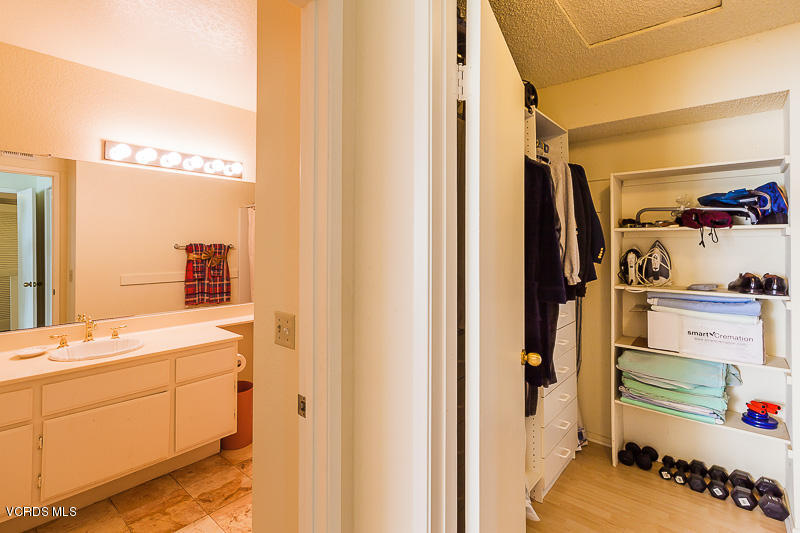 1225 Fitzgerald Road, Unit B Simi Valley, CA 93065 - Photo 26 of 34 a bathroom with a sink and a mirror