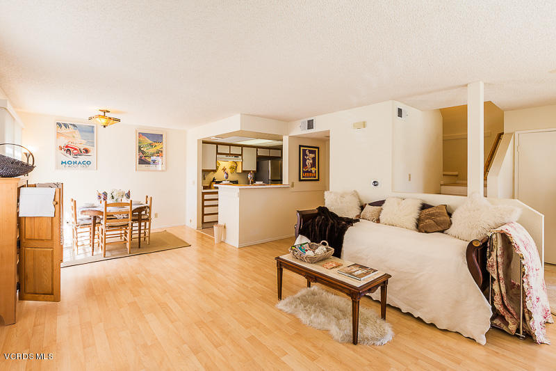 1225 Fitzgerald Road, Unit B Simi Valley, CA 93065 - Photo 6 of 34 a living room with furniture a wooden floor and next to a window