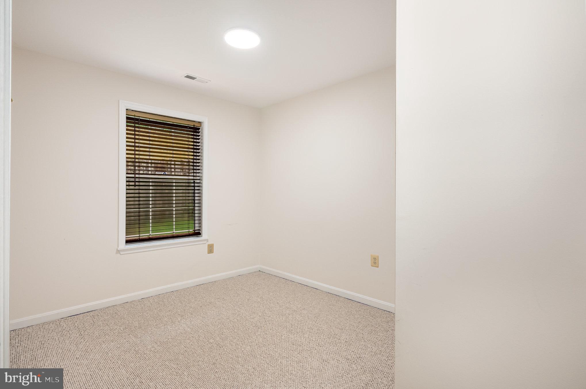 107 Wimbeldon Court Stafford, VA 22556 - Photo 26 of 32 a view of an empty room with a window