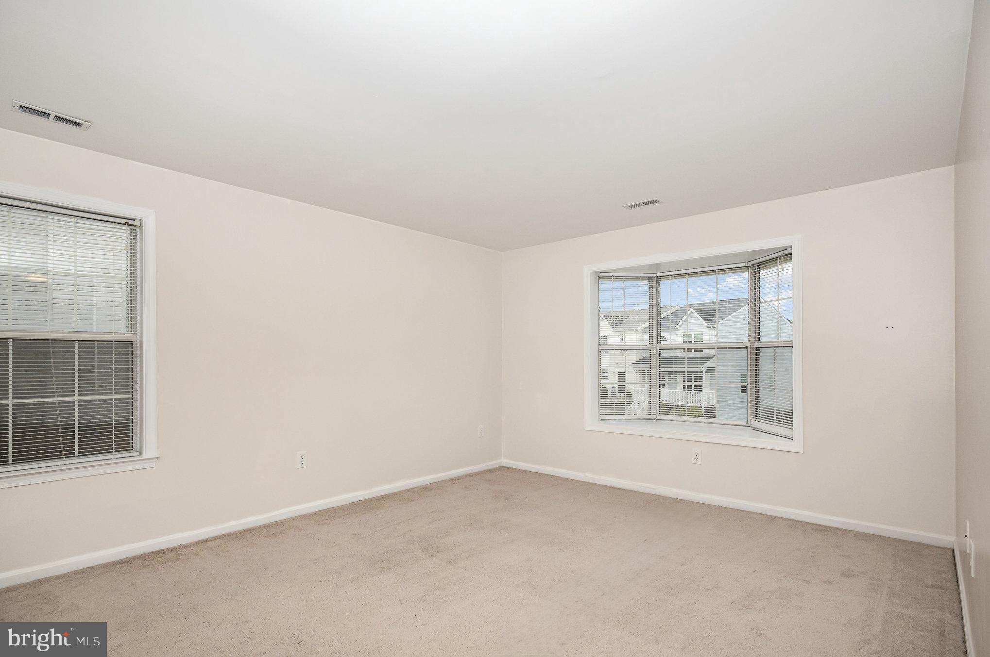 107 Wimbeldon Court Stafford, VA 22556 - Photo 6 of 32 an empty room with windows