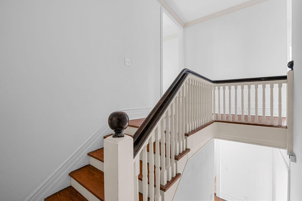 312 East 3rd Street Rome, GA 30161 - Photo 26 of 42 a view of staircase with railing and white walls