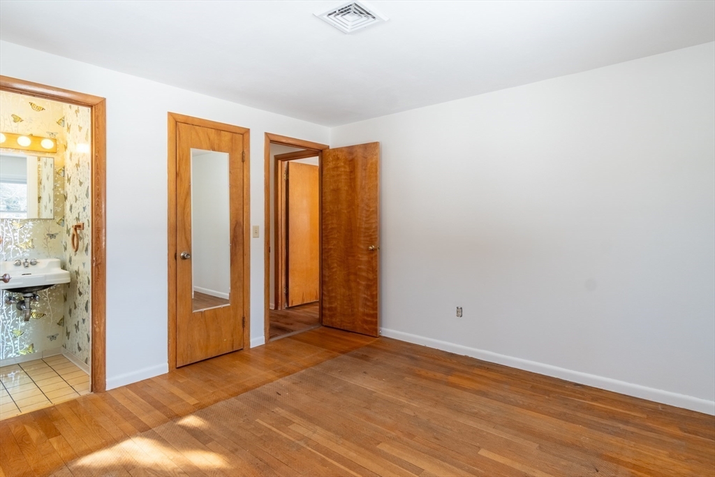 50 Oak Road Longmeadow, MA 01106 - Photo 20 of 37 a view of room with window and hardwood floor