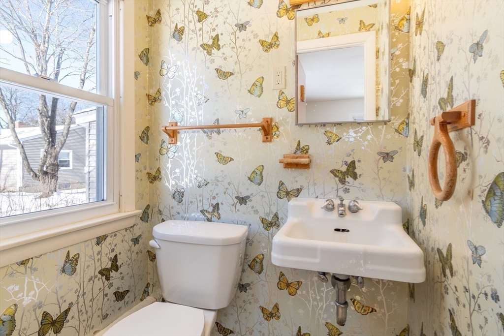 50 Oak Road Longmeadow, MA 01106 - Photo 21 of 37 a bathroom with a sink and mirror with toilet