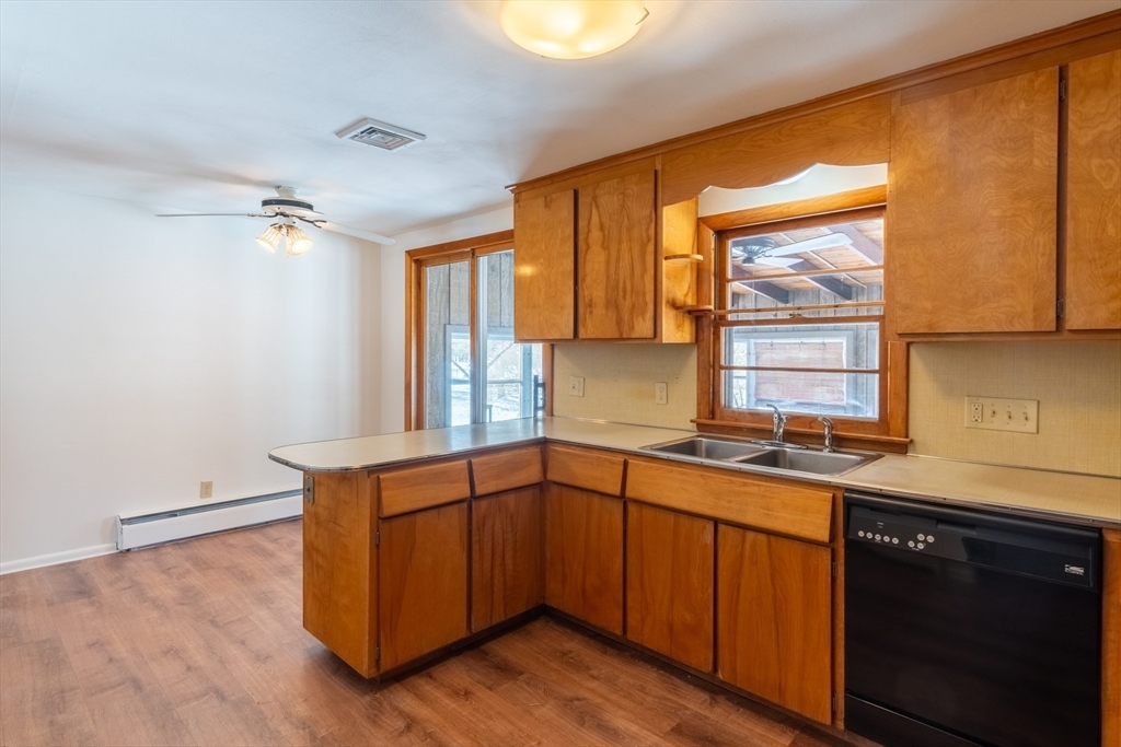 50 Oak Road Longmeadow, MA 01106 - Photo 6 of 37 a kitchen with a sink cabinets and window