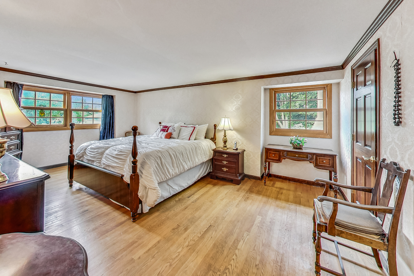 544 Northgate Road Lindenhurst, IL 60046 - Photo 17 of 32 a bedroom with a bed and large windows