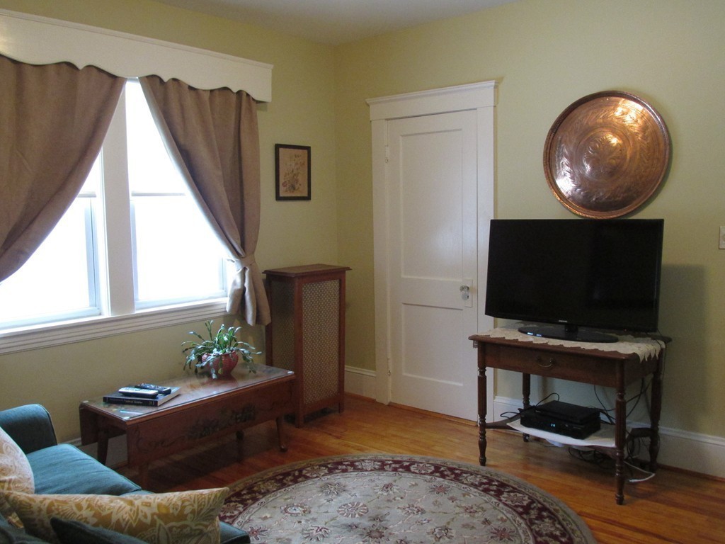 9 Pomona Road Worcester, MA 01602 - Photo 14 of 29 a living room with furniture and a flat screen tv