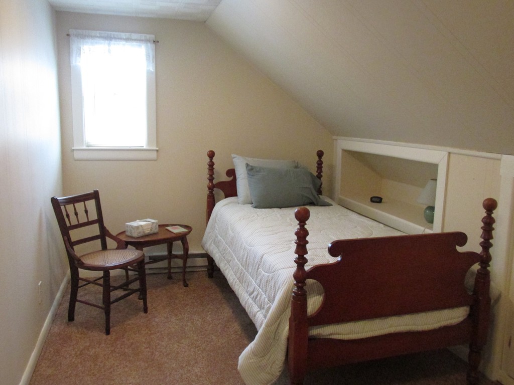 9 Pomona Road Worcester, MA 01602 - Photo 23 of 29 a bedroom with a bed and window